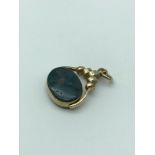 A lovely example of a heavy 9ct gold and agate swivel fob.