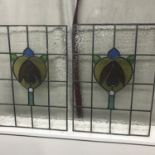 2 Matching stain glass panels.Measure 59x41.5cm
