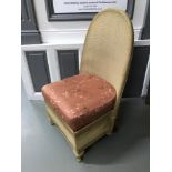 A Vintage 1950's bedroom chair with removable cushion.