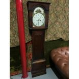 A Victorian long cased grandfather clock with weights and pendulum, Pendulum has a hand painted