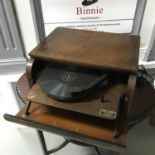 A Vintage bread bin shaped Broadcaster Plus-a-gram record player. 24X46X41CM