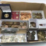 A Collection of mixed world coins includes London mint boxed coin.