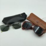 A Lot of two vintage sets of Polaroid sun glasses