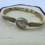 A Ladies vintage gold plated Roamer watch, number 57681, in working order, self winding