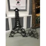 large Eiffel tower wine rack & one other