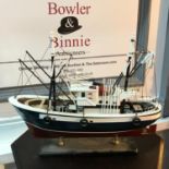 A Fishing trawler boat model on stand