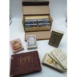 A lot of various playing cards to include; a vintage playing card case fitted with decks of cards