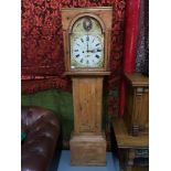 A Victorian pine cased grandfather clock, hand painted face, Maker D.Aitken. Comes with weights,