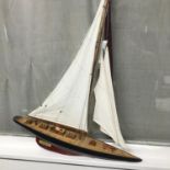 A Large wooden yacht model.