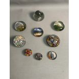 A total of nine paperweights to include a Victorian dump paperweight & three old Scottish Millefiori