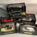 A Lot of six 1:18 scale car models, all boxed.