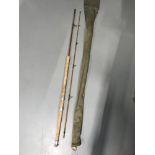 A Two piece split cane fly rod by Milwards with bag.