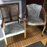 A Pair of 1940's 50's bergere back and side bedroom chairs, upholstered with floral material.