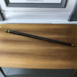 Vintage carved walking stick which converts into a pool cue.