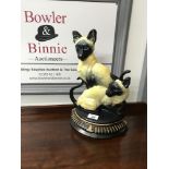 A Cast iron Siamese cat door stop, Measures 37x24cm