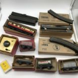 A Lot of vintage Trix twin railway items which includes 643 shell tank wagon, 1/603 open wagon