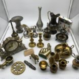 A Lot of various collectables which includes Italian Horse figure, Splendex clock, Indian brass