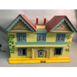 Vintage 1960's Dolls House with sliding front panel