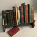A Church style small bookcase together with various old books which includes The new gate