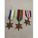 A Lot of 3 Military campaign star medals, Includes Atlantic, Pacific, French and Germany Star.