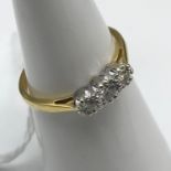 18CT Gold 0.25CT Diamond ring, 3 Bright Diamonds. Size L.