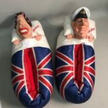 A Pair of Spitting Image Queen Elizabeth & Prince Philip slippers, Size Large.