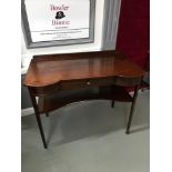 A Victorian Mahogany two tier console table. Fitted with single under drawer. Measures 73x91x50cm