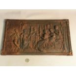 Heavy Victorian cast iron plaque depicting ladies sewing. Measures 25.5x45cm