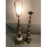 Marble and gilt metal table lamp together with silver polished candlestick. Lamp is working.