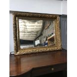 A Heavy Antique gilt framed mirror, Measures 61x76cm
