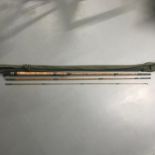 Antique 3 piece split cane fly rod by Allcocks titled "Eclipse" 10.5 foot. Comes with a bag.