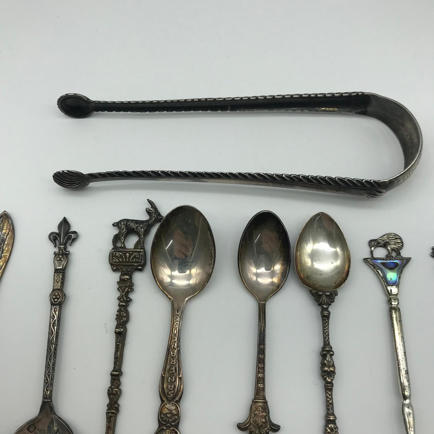 A Selection of various 800 grade and sterling silver souvenir spoons, Together with ornate sugar - Image 4 of 4