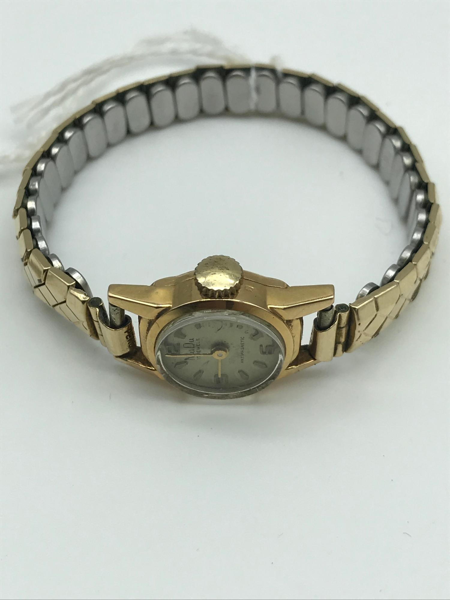 Vintage Swiss made MuDu ladies 18K Gold cased watch with gilt metal strap. 17 jewels. Non running.