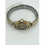 Vintage Swiss made MuDu ladies 18K Gold cased watch with gilt metal strap. 17 jewels. Non running.