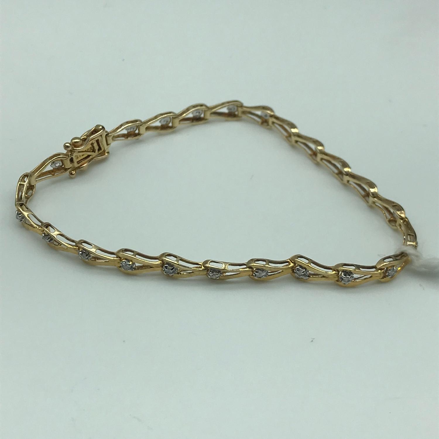 A 9ct gold & Diamond ladies bracelet. 5.67grams