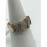 A 9ct gold and diamond cluster ring. size L.