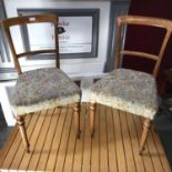 A Pair of Victorian dining chairs, upholstered with floral material and horse hair.