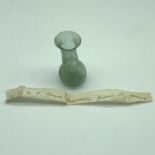 An Ancient Roman tear bottle from Cyprus. Comes with a small slip of paper stating its date and