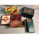 A selection of vintage games to include; 'Monopoly', 'Tucks picture puzzle' & 'Play Skee-Ball'
