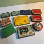 A quantity of vintage cigarette advertising tins.