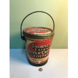 A Vintage advertising tin shaped like a bucket, for Thorne's Extra Super Creme Toffee, Measures 21cm