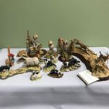 A Collection of Teviotdale animal figurines, Includes Owls, Sheep dogs, Mouse with poppy and Cheetah