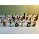 A Lot of vintage Whisky miniatures which includes Dewars white label, Tullibardine Dunfermline