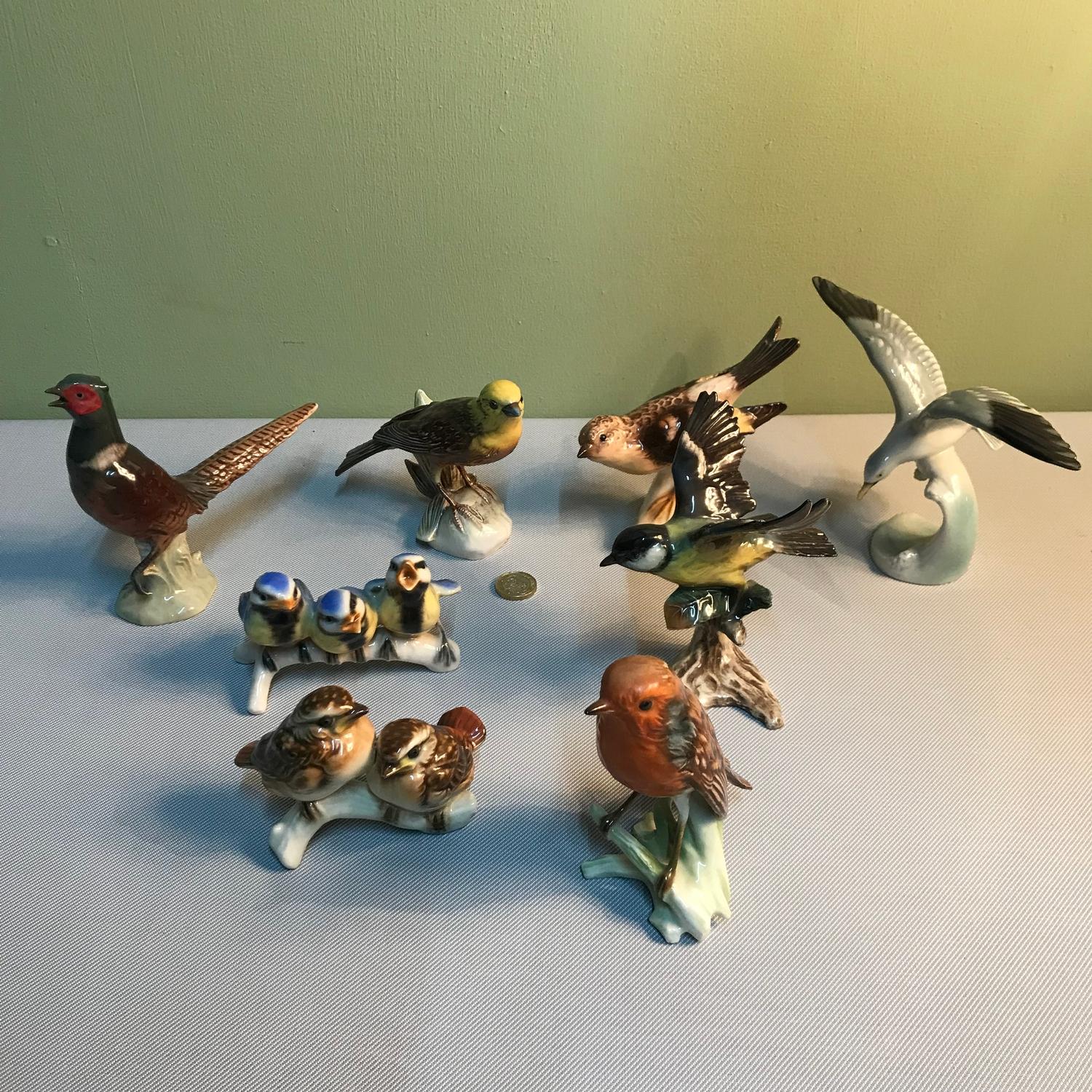 A Lot of 8 Goebel bird figurines, Includes Robin, Great Titmouse, Seagull, Pheasant & Yellow Hammer.