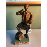 A 20th century Mackinlays scotch whisky advertising figure of a kilted figure, 35cm in height