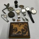 A mixed lot of collectables to include Ingersoll pocket watch, Trench art snuff box, Poker work book