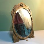 A Stylish Bevel edge dressing table mirror, moulded with arts and crafts designs framing c1920.