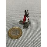 A Small 925 silver gentleman Fox with white and red enamel coat and white enamel tail. Measures 3.