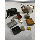 A Quantity of collectables which includes rare pig measuring tape, Japanese stamped metal elephant