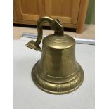 A Large brass ships bell.